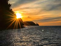 Sonnenuntergang über Piran von Strunjan aus beobachtet