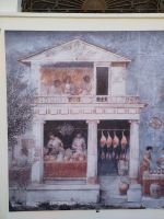 Moderne Künstler haben hier im römischen Stil Bilder vom römischen Fischmarkt von Cádiz nach ihrer Vorstellung gemalt