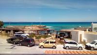Fischerbootshütten an der Platja Es Pujols