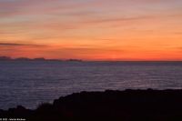 Wanderreise Menorca - Sonnenuntergang in Cala Blanca - Blick nach Mallorca - Cap de Formentor