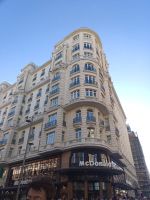 Gran Via-historische Gebäude, Edificio de los Escoceses mit McDonald - Madrid, Spanien
