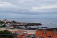 Strand und Hafen von Comillas