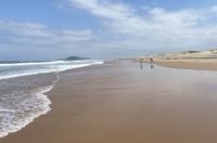 Sonne, Wind, Sandsturm und starke Strömung im  warmen Wasser