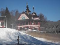 eines der historischen Häuser von Pustevny