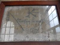 Dieses alte Wandbild im alten Königspalast wird durch einen Rahmen aus Glas geschützt.