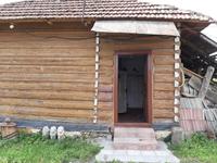 Eingang in das Holzhaus.