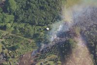 Hilo - Helikopterrundflug mit Blick auf einen Lavastrom