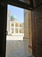 Blick aus der Kalon-Moschee auf die Miri-Arab-Medrese, Buchara