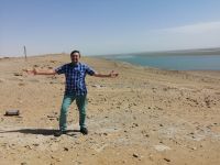 Fotostopp an der Grenze zu Turkmenistan: im Hintergrund der Fluß Amudarja