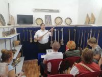 Vorführung des Musikinstrumentenmacher (Sher-Dor-Medrese am Registan-Platz), Samarkand