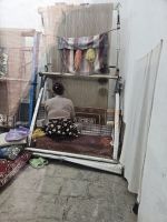 Chgiva - Frau am Webstuhl