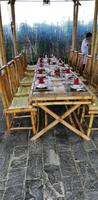 Gedeckte Tafel im Gartenrestaurant mit Kochkurs Hoi An
