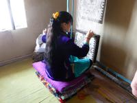 Vorführung, Handarbeit in der Teppichweberei