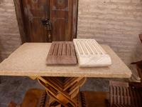 Schnitzer-Werkstatt in Chiwa, Koranhalter