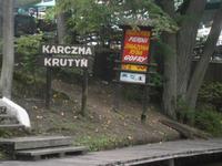 Werbung an einer Gaststätte am Fluß