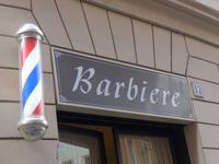 Leuchtreklame die Geschäft eines Barbiere (Herrenfriseur) 