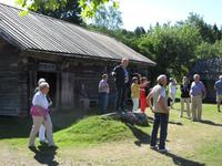 Führung in Jan Karlsgarden auf Aland