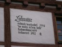 Hinweis auf die Geschichte des Hauses