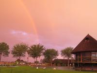 Regenbogen über der Lapa Lange Lodge