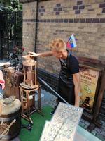 Münzenpräger auf dem Griboedow-Kanal