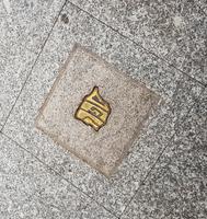 Ein Judensymbol auf dem Fussweg