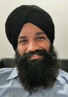 Ein netter Sikh gibt uns Bücher in deutscher Sprache über die Religion