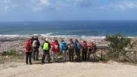 Wandergruppe mit Blick auf Trapani