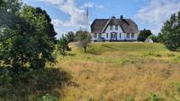 Kapitänshaus auf einer Warft auf Föhr