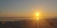 Die Sonne geht unter, Blick aus dem Restaurant des Hotels in Büsum