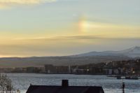 Tromsø - eine sogenannte Nebensonne am Himmel - eine 
