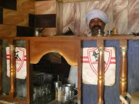 netter Kaffeehausbesitzer