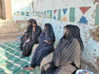 bitte recht freundlich