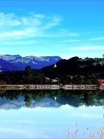 Tag 6: Die Kapelle St. Nikolaus spiegelt sich im Inn