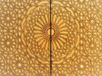 das Spinnennetz in Bronze