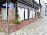 eine Gasse in Lübben: Hinter der Mauer