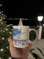 Mit einem Glühwein die Stimmung genießen