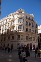 Andalusische Art Decó-Architektur: Früher ein Kaufhaus, heute sind nur noch unten Geschäfte und oben teure Wohnungen