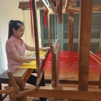 Traditionelle Webstuhl-Arbeit in Hoi An