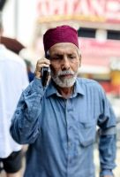 Ein Malaysier mit traditioneller Kopfbedeckung in Georgetown