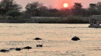 Namibia - Bootsfahrt Okavango - Sonnenuntergang