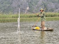 Fischer in der trockenen Ha-Lang Bucht