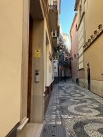 Spanien, Malaga, Fußweg aus Flusssteinen