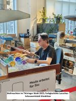Schauglasbläser in der Farbglashütte Lauscha