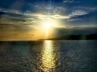 Die Sonne geht vor Tauranga unter