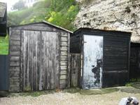 Alte Fischerhütten am Strand von Etretat