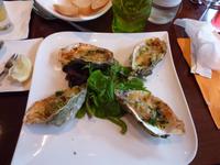 im Fischrestaurant - gegrillte Austern